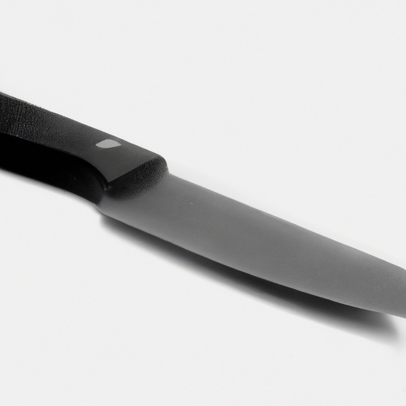 Serrated knife slicing tartlet.