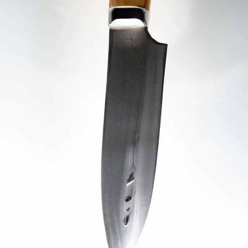 Sharp stainless carving knife on wooden cutting board